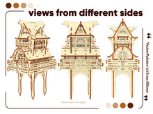 Load image into Gallery viewer, Laser cut wooden model of a Garden Gnome House on stakes, featuring a veranda, curved roof, and two floors.
