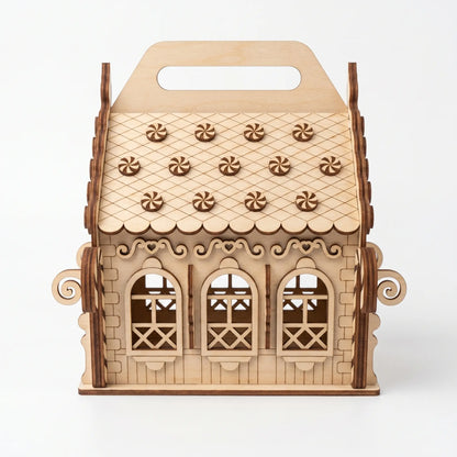Wooden gingerbread house model on a white background