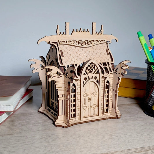 A beautiful angled perspective view of an assembled gothic fantasy crypt centerpiece crafted from fine laser cut plywood.