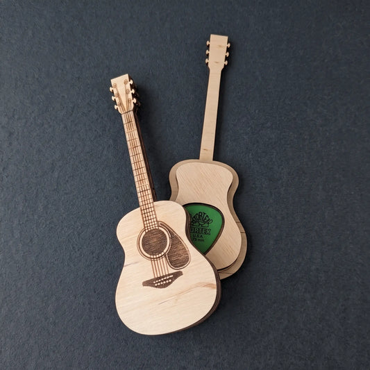 Acoustic guitar pick holder laser cut box are displayed on a dark slate background. 