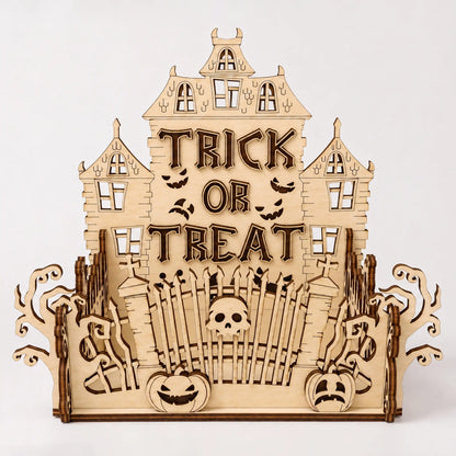 Wooden Halloween-themed decorative piece with 'Trick or Treat' text on a white background