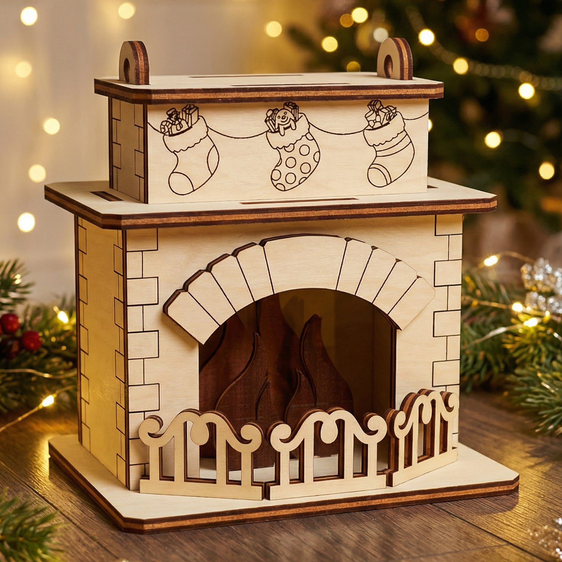 Laser cut wooden Christmas Fireplace with three hanging stockings on the mantel, and a warm glowing fire effect, displayed against a softly blurred Christmas tree background.