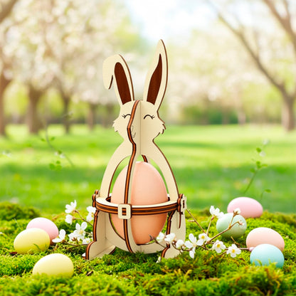 Laser cut plywood wooden Easter bunny egg holder on a mossy path, surrounded by small purple and white flowers and sparkling fairy lights, creating a magical dark evening garden atmosphere