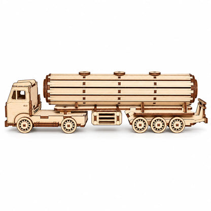 A laser-cut wooden model of a tanker truck made from natural wood pieces, displayed on a clean white background.