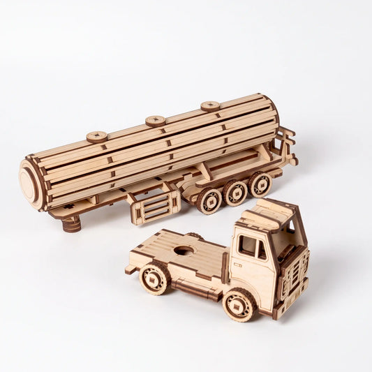 Two parts of wooden 3D truck model, including a tanker truck and a flatbed truck, crafted from natural laser-cut wood on a clean white background.