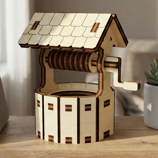 Rustic laser cut wooden Little well showcasing a hand-cranked winding drum, protective roof, and decorative stone accents, displayed against a blurred cozy indoor background.