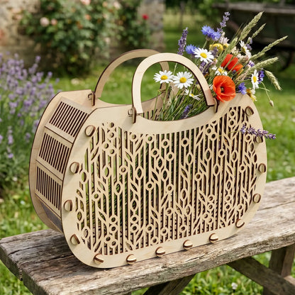 Laser cut plywood basket filled with fresh wildflowers like poppies and daisies, sitting on a weathered bench.