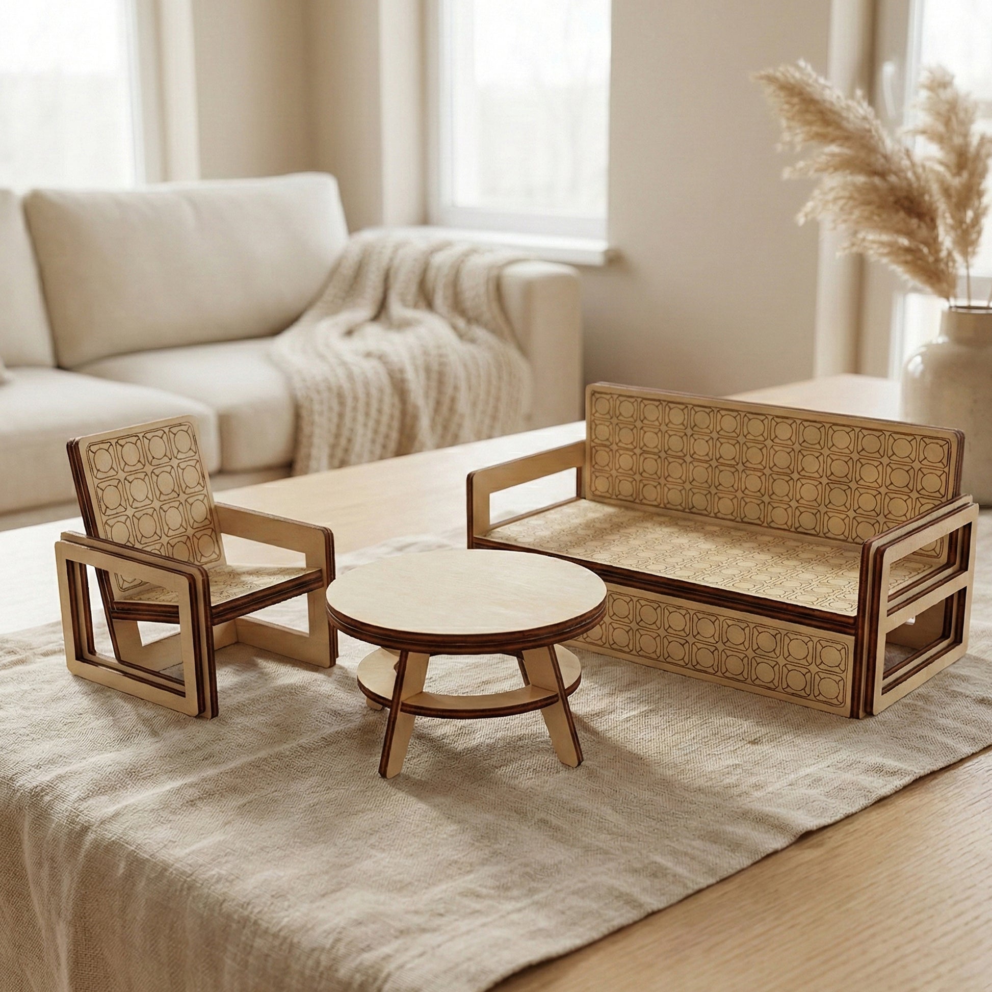 A modern lounge furniture set for dollhouses made of laser cut plywood. Includes a sofa and armchair with engraved geometric patterns and a round coffee table. Arranged on a linen runner in a bright, Scandi-style living room.