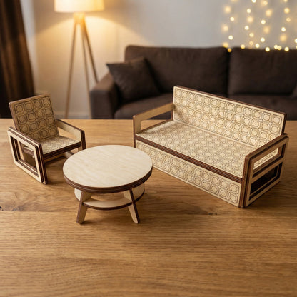 Miniature wooden living room set crafted from laser cut plywood. The sofa and chair feature an intricate square-and-circle engraved texture. Shown on a wooden table with soft warm lighting and fairy lights in the background.