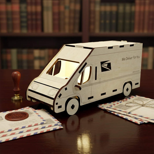 Laser cut wooden plywood mail truck with glowing interior light, featuring an engraved eagle logo and "We Deliver For You" text. The 3D model is on a desk with vintage letters, a wax seal, and a library background