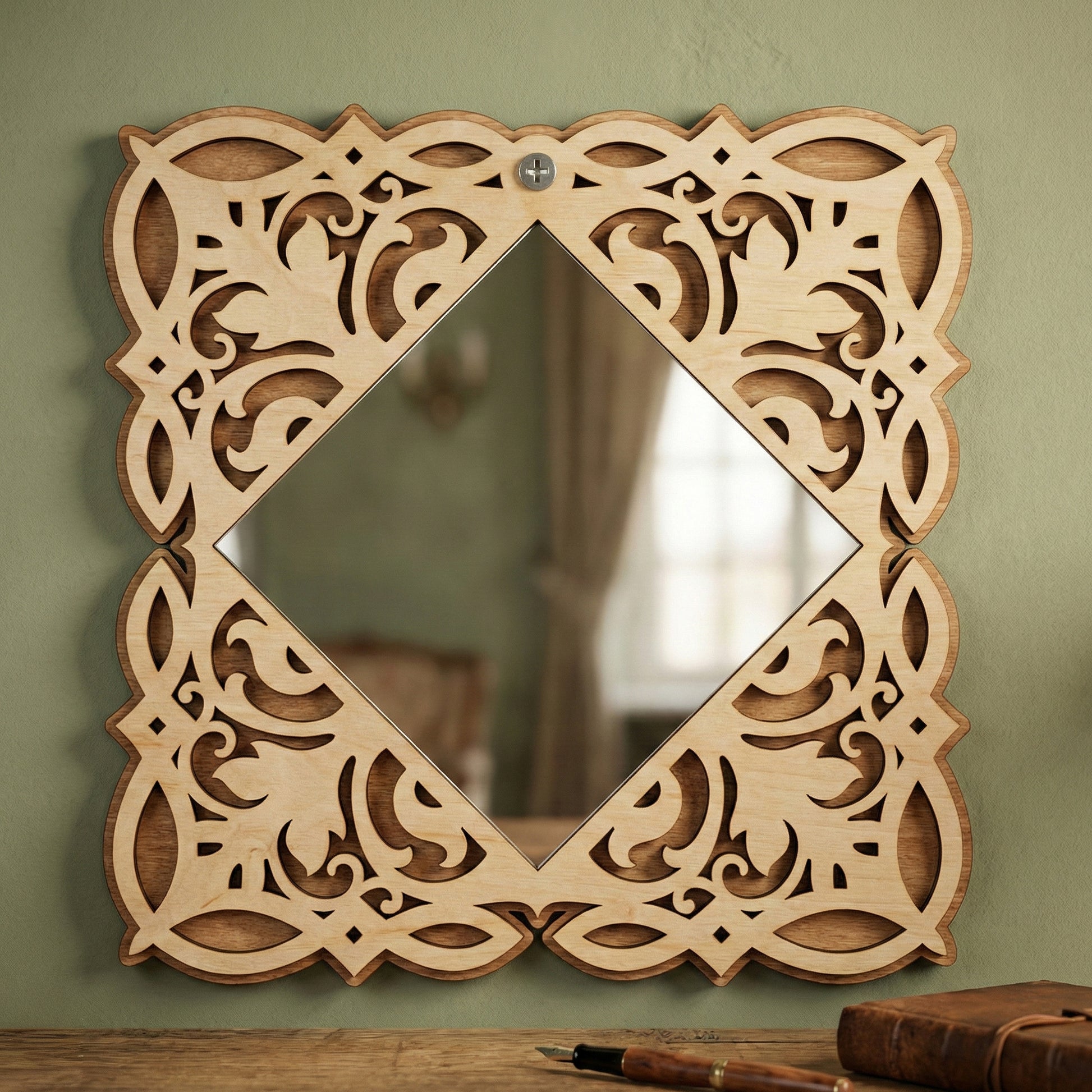 Square laser cut wooden Mirror ornaments with a diamond center, positioned against an olive wall background.
