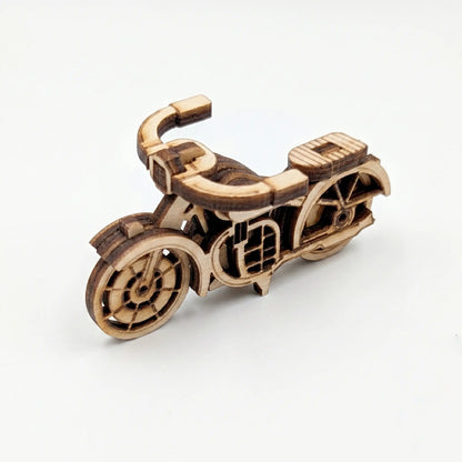 Wooden model of a motorcycle on a white background