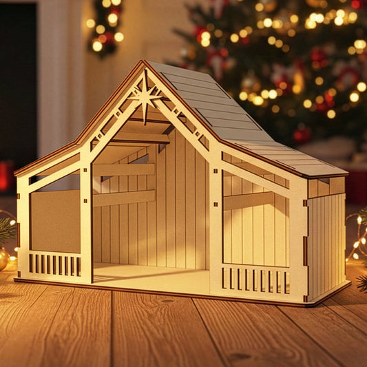 
Wooden laser cut Nativity barn #6 with arched open front, detailed Bethlehem star accent on the roof, and spacious stable interior, shown against a softly blurred Christmas tree background.