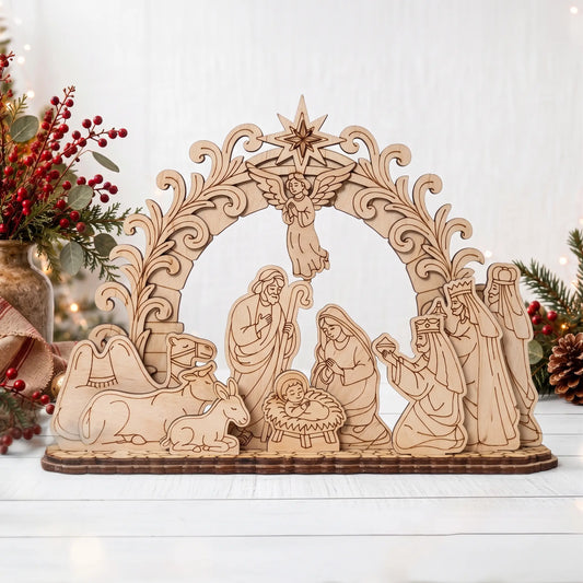 Frontal shot of laser cut plywood holy family nativity set on light wood planks with holiday berry branch.