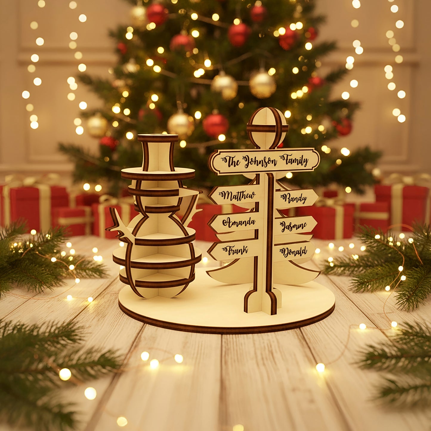 Personalized laser cut wooden North Pole signpost with family member names next to a cheerful snowman figure, shown on a warm bokeh-lit holiday background.