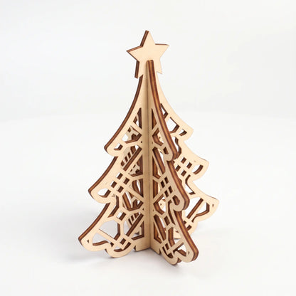 Isometric view of 3D laser cut plywood Christmas tree figurine with geometric lattice pattern on seamless white backdrop.