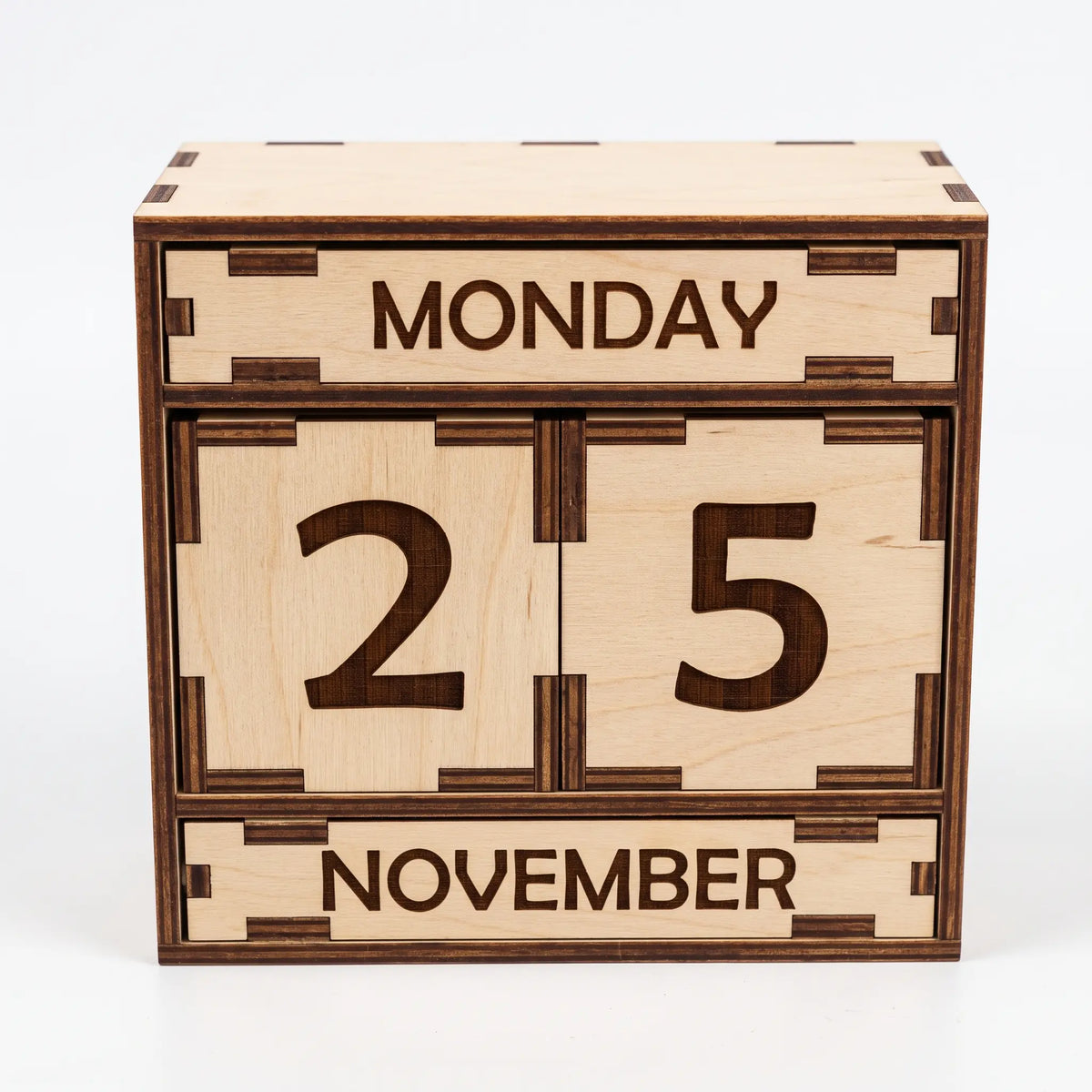 Front view of desktop laser cut plywood perpetual calendar box with date blocks and engraved slats on white background.