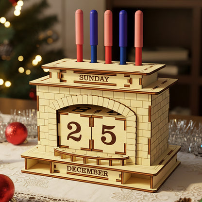 
Laser cut wooden Perpetual calendar & Pen holder Fireplace shaped like a cozy brick hearth with rotating date blocks, day indicator and five colorful pens as "candles" on the mantel, displayed against a warm Christmas tree bokeh background.