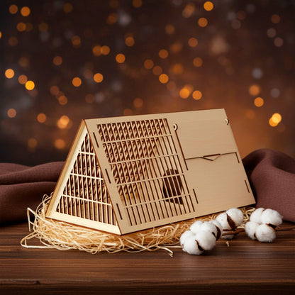Laser cut wooden plywood Pet Cage or habitat divider, featuring an A-frame triangular roof and detailed slotted ventilation grid on the sides and top. The lightweight plywood structure, designed as a DIY kit, has a small, central access door on the side panel. White background, showing the wood craftsmanship.