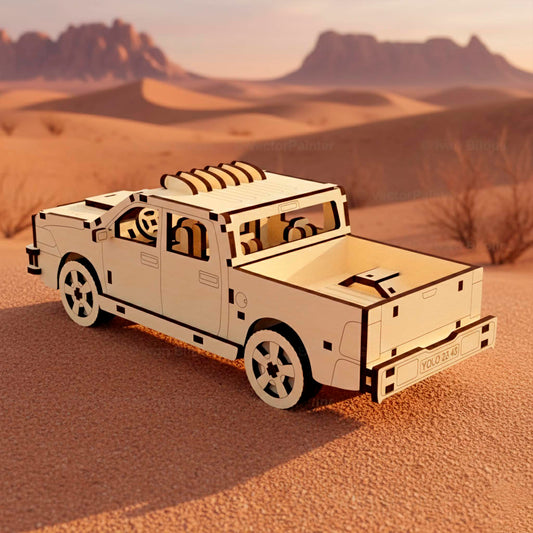 Rear angle of a laser cut wooden plywood pickup truck assembly kit in a desert landscape. The description includes the open cargo bed, detailed interior seats, steering wheel, and realistic tires, showcasing precision wood craftsmanship and design.