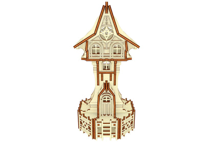 Straight front view of an intricate miniature fantasy tower house designed for laser cut plywood fabrication.