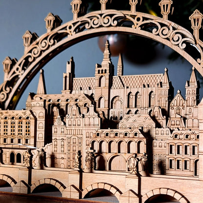 A gorgeous right side angled perspective shot of the intricate 3D Prague town light arch crafted from laser cut plywood.