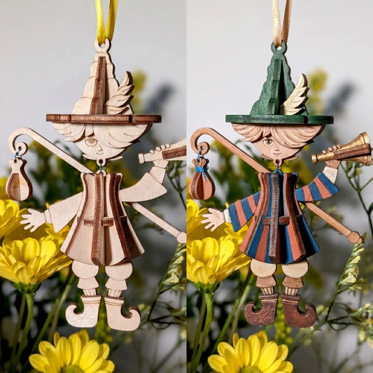 Before and after painting view of a laser cut wooden bard marionette ornament, showing natural plywood and colorful hand painted fantasy nursery decor.