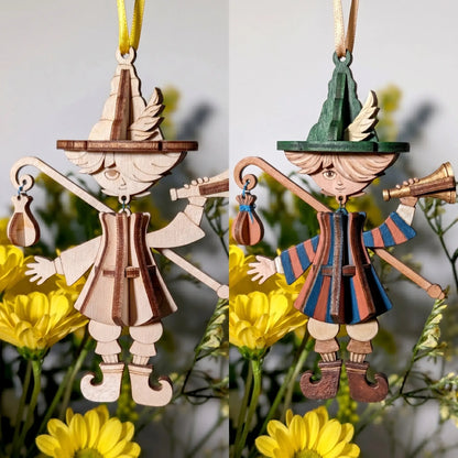 Before and after painting view of a laser cut wooden bard marionette ornament, showing natural plywood and colorful hand painted fantasy nursery decor.