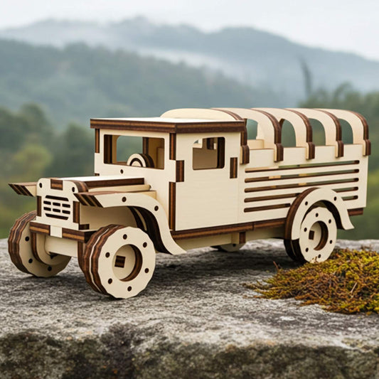Laser cut wooden plywood safari truck model with intricate layered details and curved roof ribs. The 3D assembly toy is displayed on a natural stone with moss, set against a scenic, misty mountain and forest background.