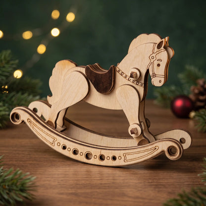 A wooden rocking horse toy made from laser-cut plywood, displayed on a wooden surface with a festive background