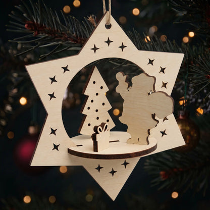 3D laser cut plywood star ornament with standing Santa and Christmas tree figurines hanging from evergreen branch