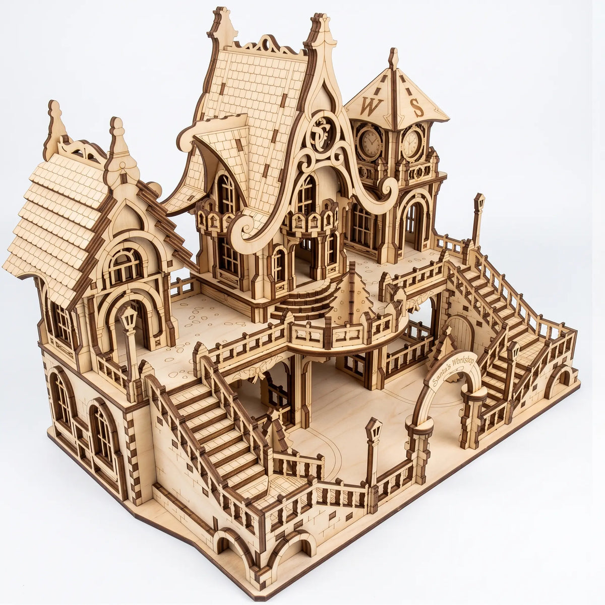 High-angle empty view of laser cut plywood Santa workshop model showing intricate two-level layout.