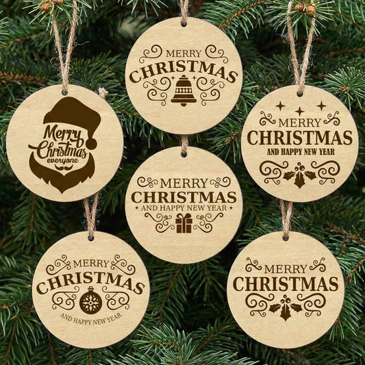 Set of 6 wooden laser cut Christmas tree toys featuring round ornaments with engraved "Merry Christmas" and "Happy New Year" messages, festive icons like bells and gifts, hanging on a natural Christmas tree background.