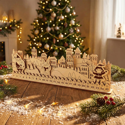 Charming laser cut wooden Simple Advent Calendar depicting a festive town scene with playful Santa characters and countdown days 1-25, shown in front of a twinkling holiday tree background.
