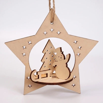 Front view of laser cut plywood star ornament with 3D miniature snowman, sled, and tree, hanging against white base.