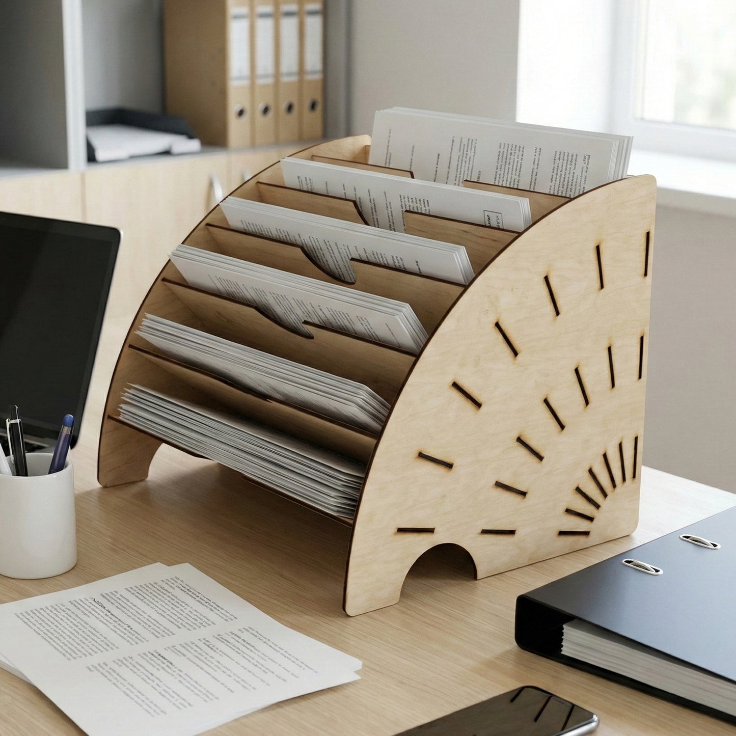 Wooden laser cut Stand for documents with curved multi-tiered slots holding papers and decorative sunburst cutouts on the side, displayed on an office desk background with laptop and files.