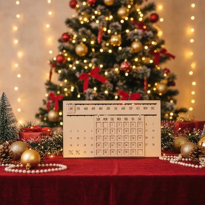 Intricate laser cut The Eternal Calendar featuring adjustable wooden panels for months, dates and weekdays, set against a festive blurred Christmas tree lights background.