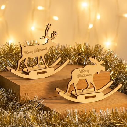 Laser cut wooden Toys of deer and elk for Christmas featuring two rocking reindeer figures engraved with "Merry Christmas" on curved bases, displayed against a golden tinsel and fairy lights background.