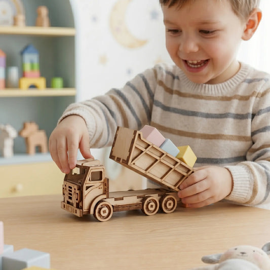 Child playing with wooden laser cut toy truck and blocks on a table