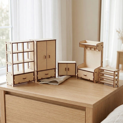 Five different miniature storage units for dolls made from laser cut plywood. Includes a tall wardrobe, open shelving, a sideboard, and an entryway hall tree. Displayed on a modern wooden dresser in a bright interior setting.