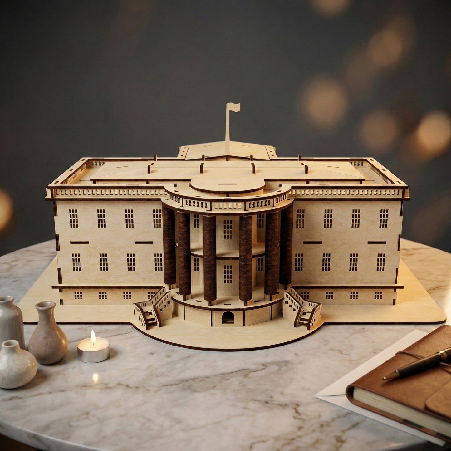 Rear view of the laser cut plywood White House model, showing the iconic semi-circular balcony and curved portico with dark columns. Detailed staircases lead to the base. Photographed on a marble surface with warm, bokeh lighting.