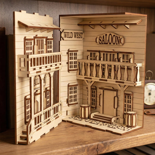 Open-view of a laser-cut birch plywood Wild West saloon book nook showing a balcony, saloon sign, and dark burnt edges.