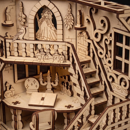 laser cut book nook model of a detailed interior with stairs and decorative elements
