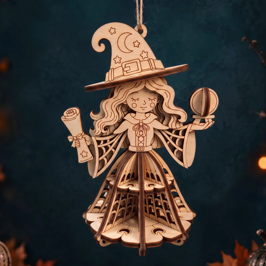 Hanging laser cut plywood witch figurine holding scroll and orb, featuring tiered cut-out 3D skirt on moody background.